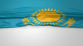 Kazakhstan National Flag, Flag folded in half and placed on white paper